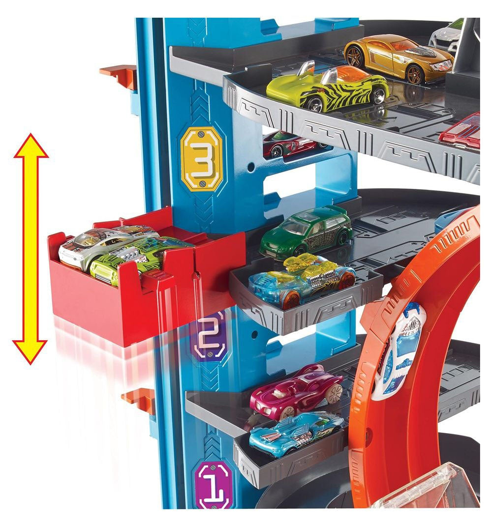 Hot Wheels Ultimate Garage Tower Shark Loop Racetrack, 2 Vehicles