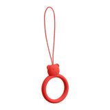 Um cordão de silicone para um anel de urso de telefone em um dedo vermelho