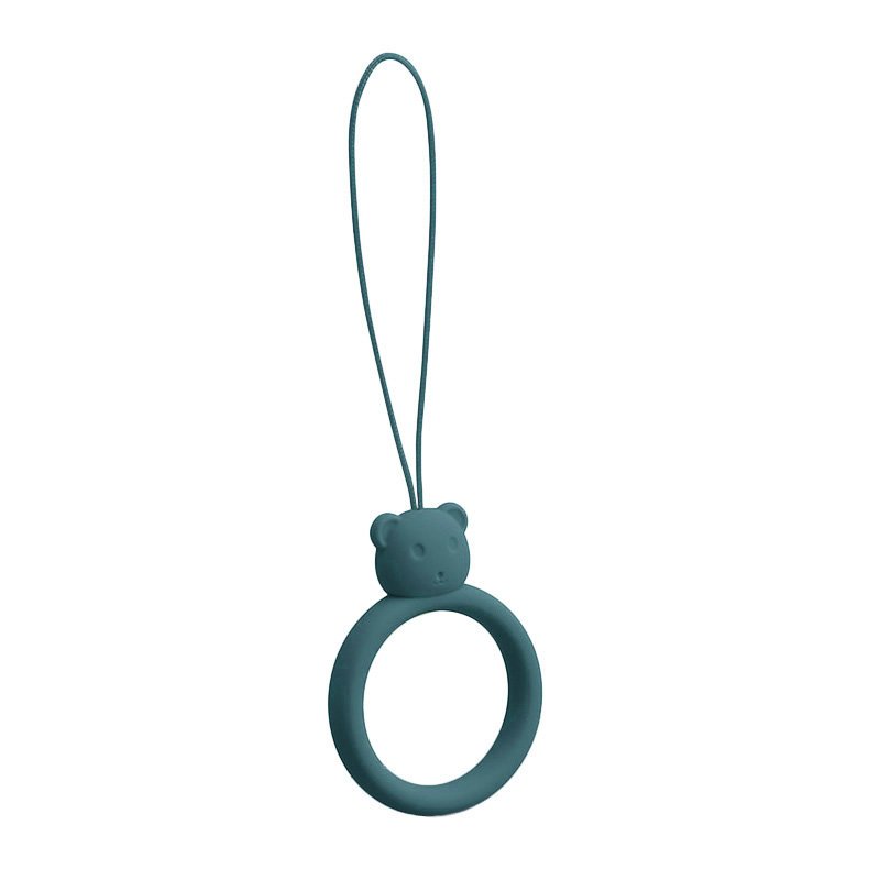 Um cordão de silicone para um anel de urso de telefone em um dedo verde